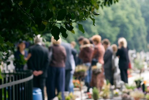 Family at a burial - Fremstad Law